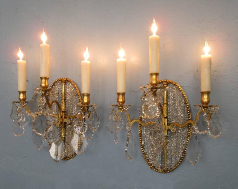 Pair of 19th Century Italian Neoclassical Crystal Medallion Back Sconces